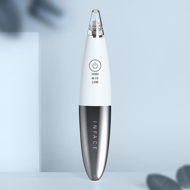 Inface eléctrico Eliminador de espinillas faciales e aspiradora de punto negro.